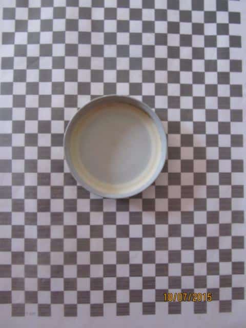Karopapier mit Marmeladeglasdeckel